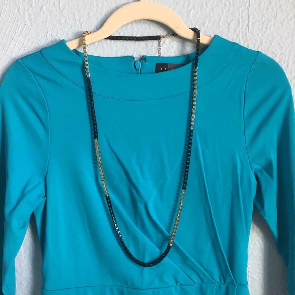 Guess black and gold necklace